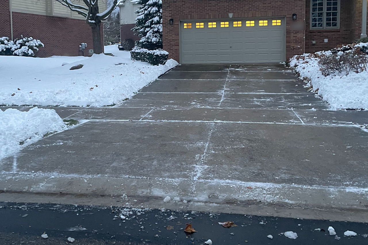 The same driveway cleared down to the pavement